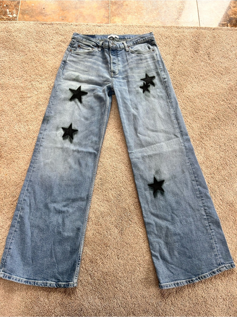 Re/Done Light Blue Wide-Leg Jeans with Black Star Patches